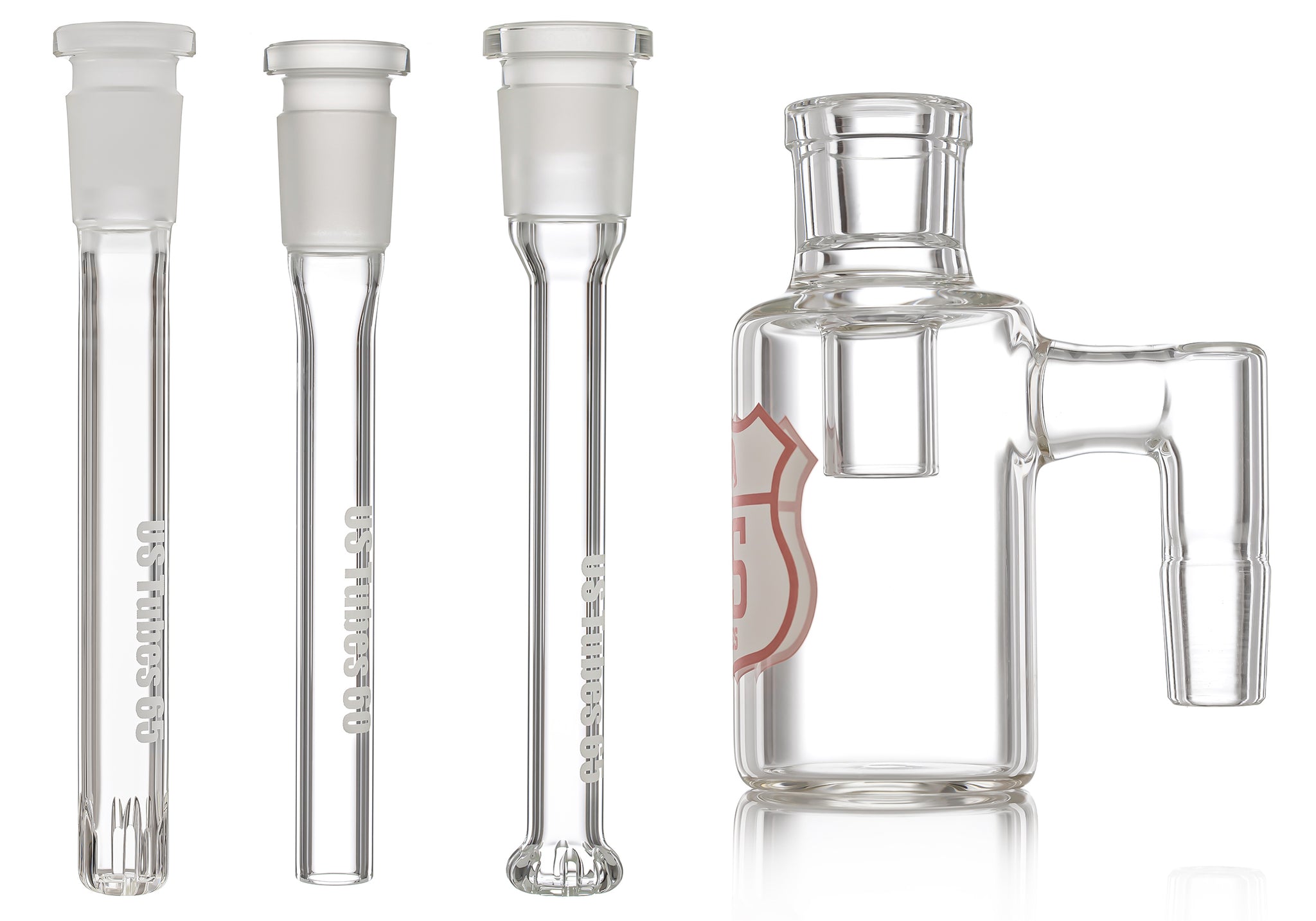 Four US TUBES items in a row. From left to right, Showerhead Downstem, Open Ended Downstem, Circ Downstem, and Side View of a Dry Catcher